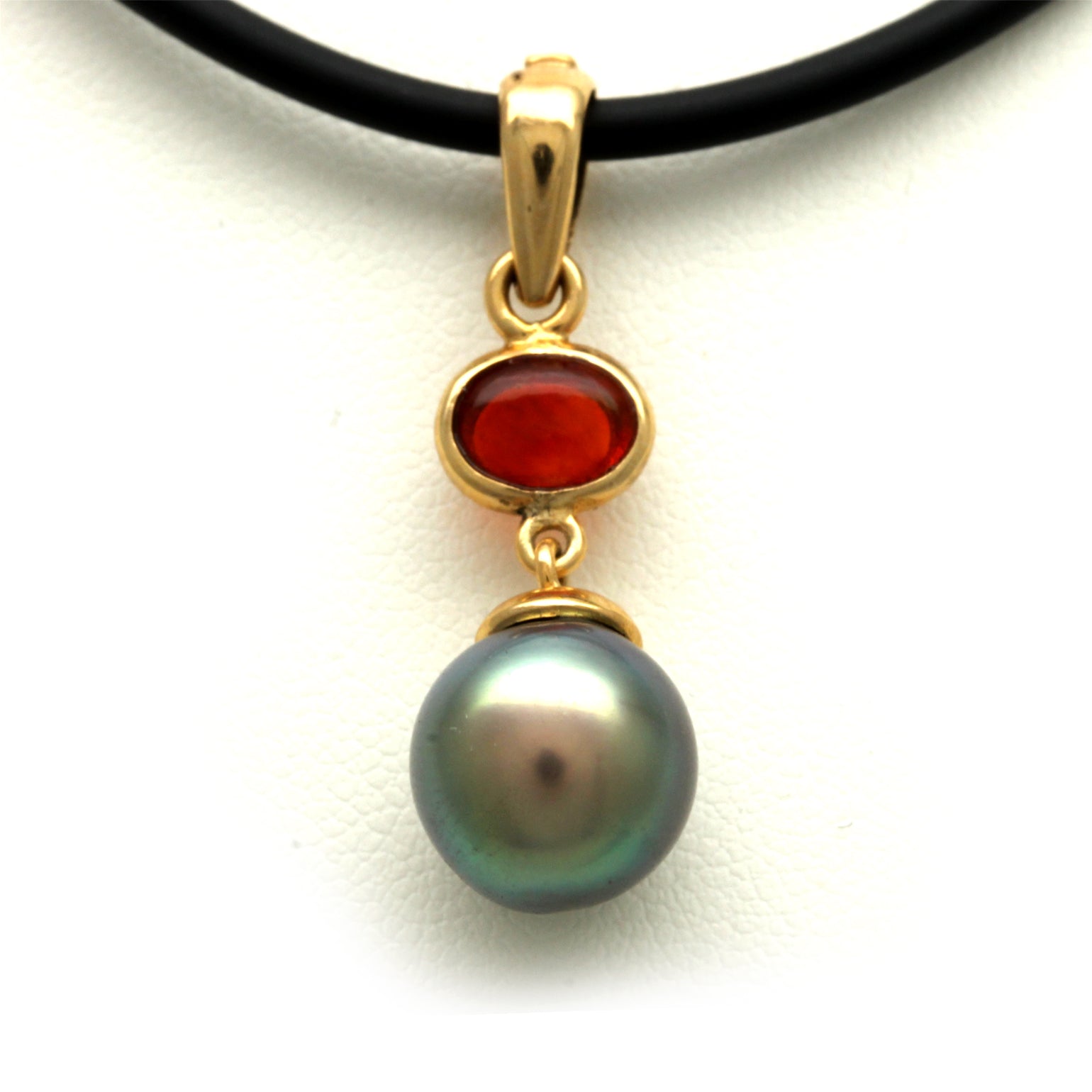 Cortez Pearl with a Strong Green Overtone and a Red Fire Opal set on 14KY Gold Pendant