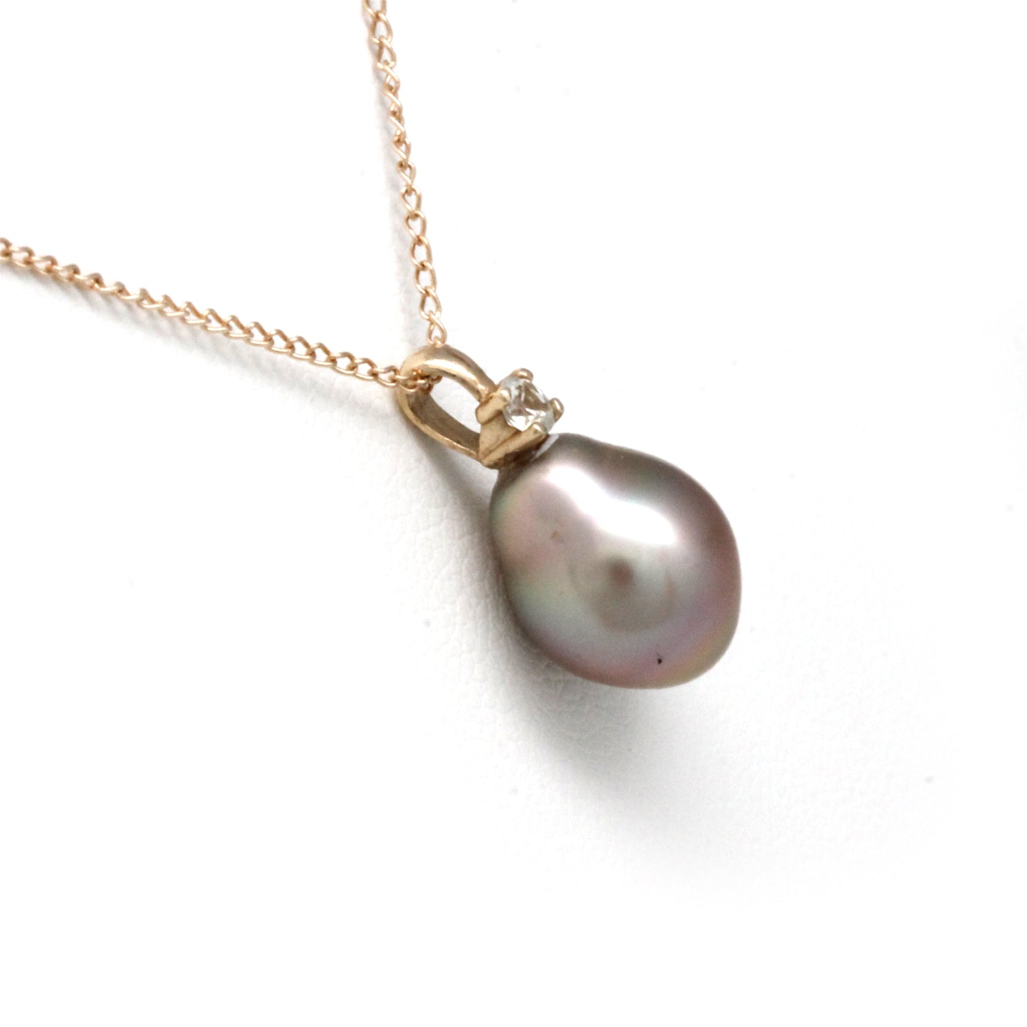 Lustrous light iridescent Cortez Pearl on 14K Yellow Gold Pendant and Chain with Sapphire