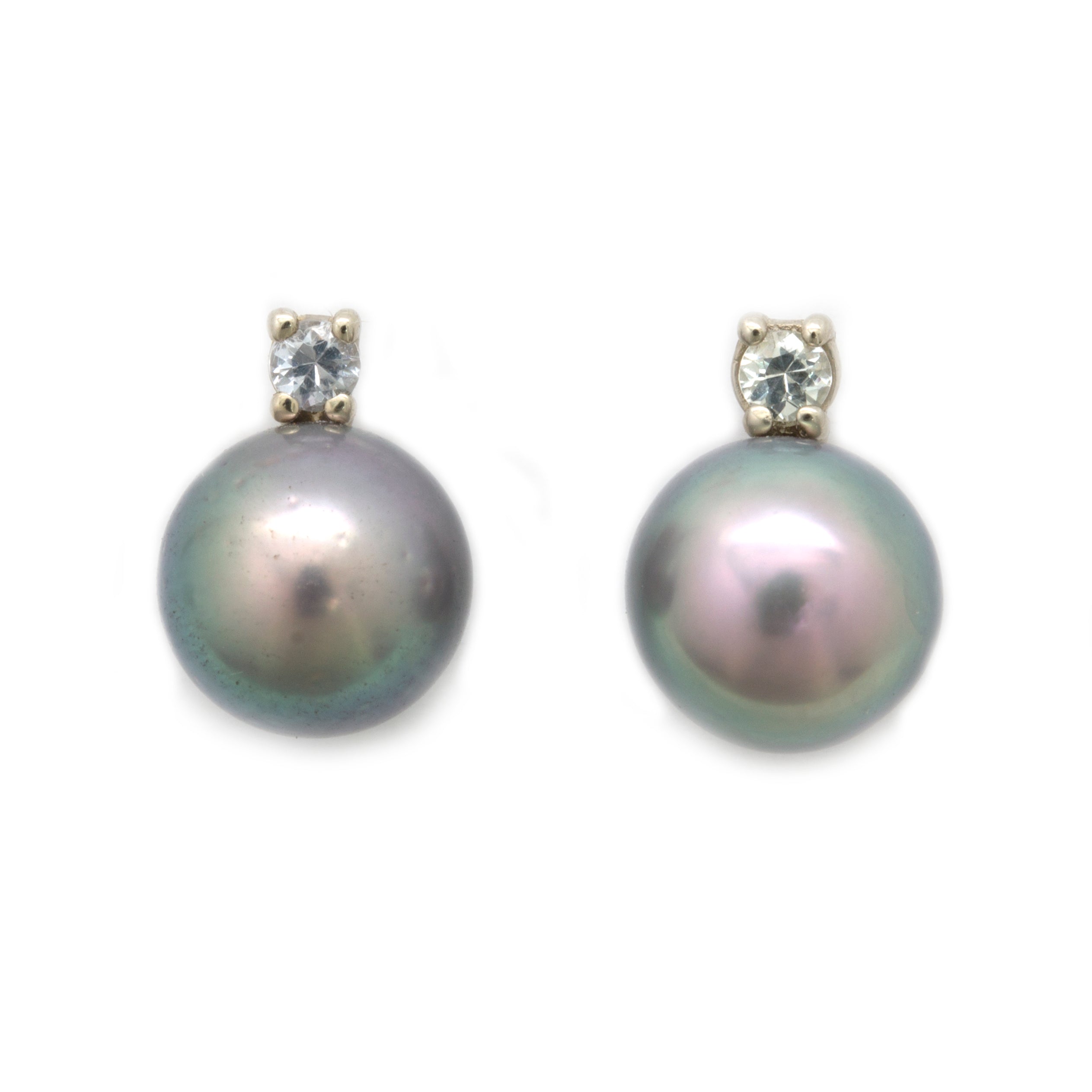 Pink Cortez Pearls with an impressive Green Overtone in 18kw with Montana Sapphires