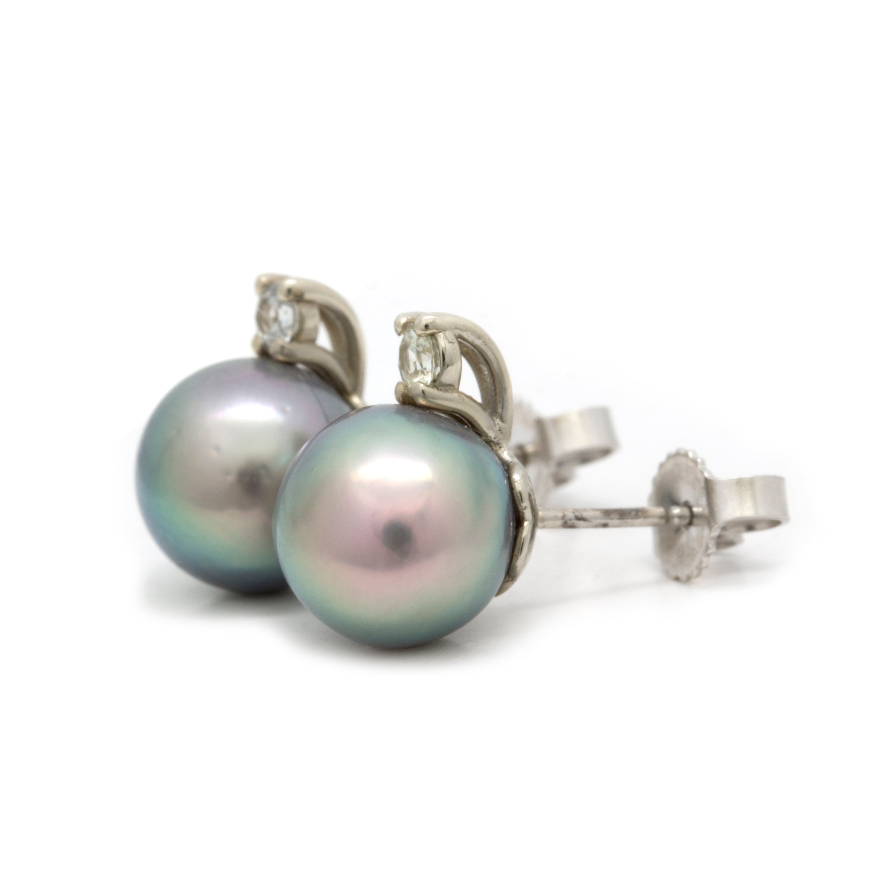 Pink Cortez Pearls with an impressive Green Overtone in 18kw with Montana Sapphires